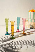 SET OF FOUR WAVY TRUMPET CHAMPAGNE GLASSES - ONE EACH COLOR